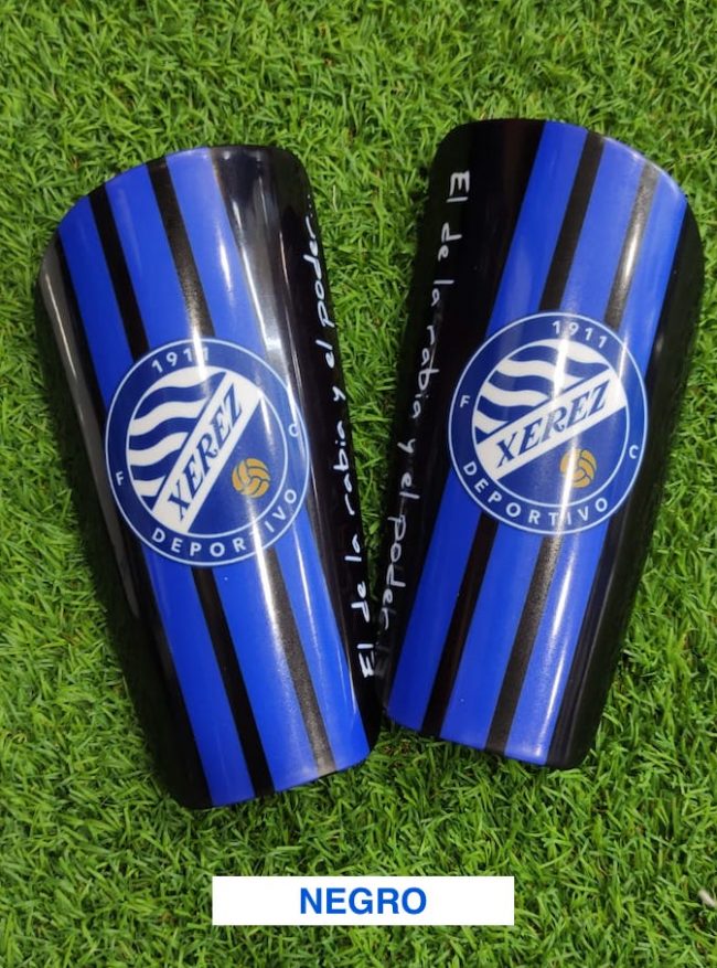 espinillera-escudo-negras Espinillera Escudo Negra